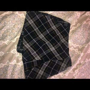 a plaid skirt with shorts underneath